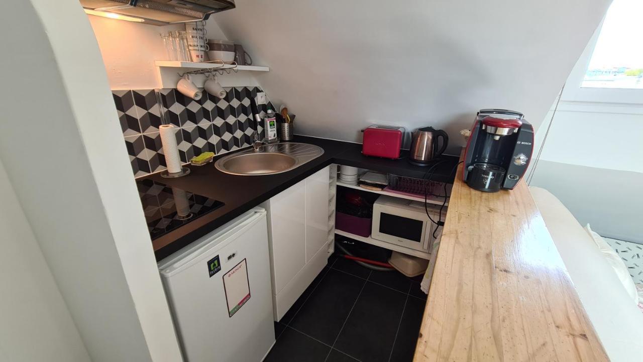 Appartement Coeur De Paris Avec Vue Sur Les Toits Exterior photo